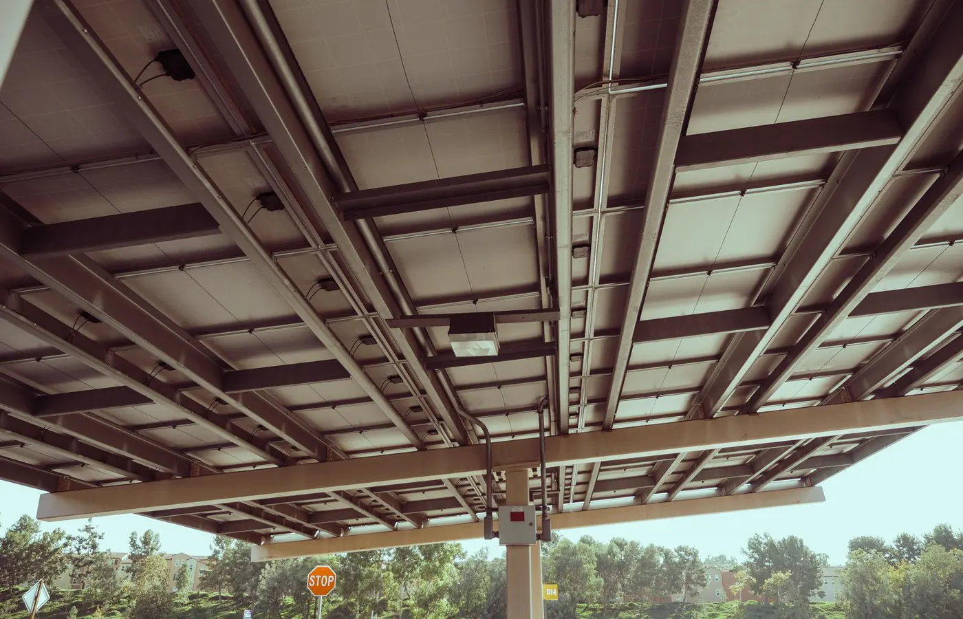 Metal mounting structure beneath installed solar panels
